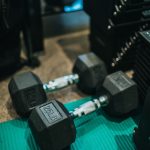 2 black and gray dumbbells